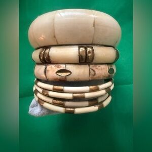 Stack of Cream bones & brass Bangles